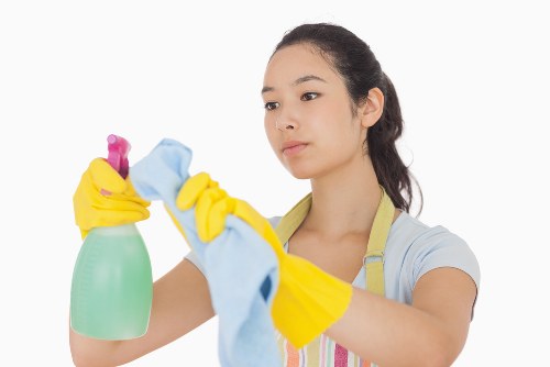 Local floor cleaning team working in an NW10 apartment